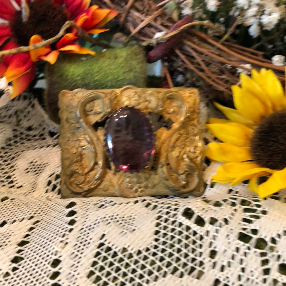 Brass with purple colored stone broach🌻